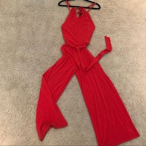 Great coral/red jump suit for fall wedding!